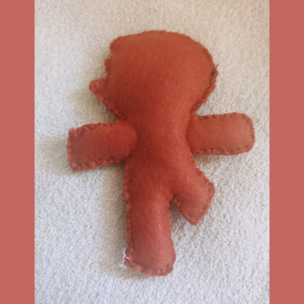 Upset Gingerbread Man Cat Toy